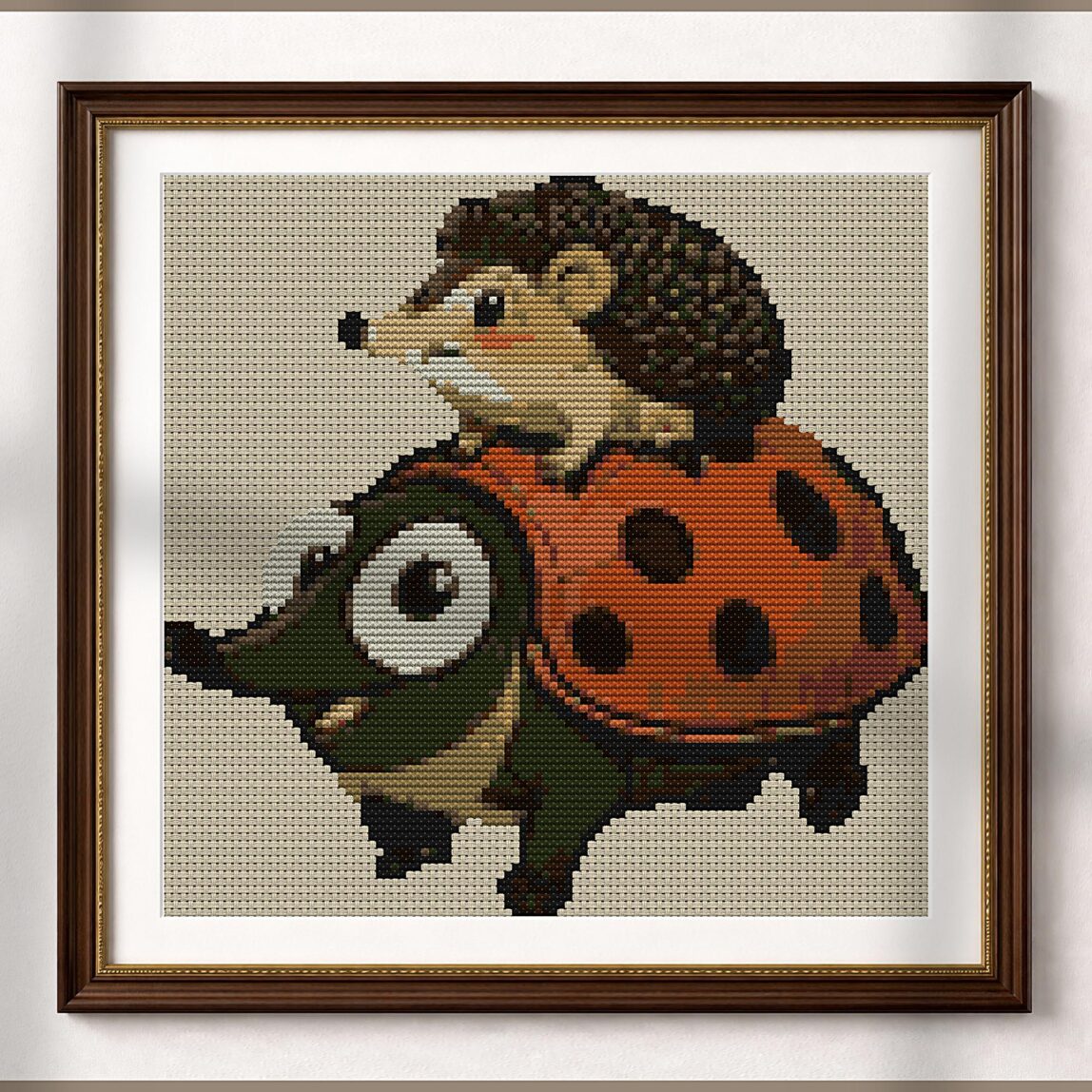 riding-hedgehog-ladybug alternative framed mockup riding-hedgehog-ladybug alternative framed cross stitch mockup, realistic finished embroidery presentation