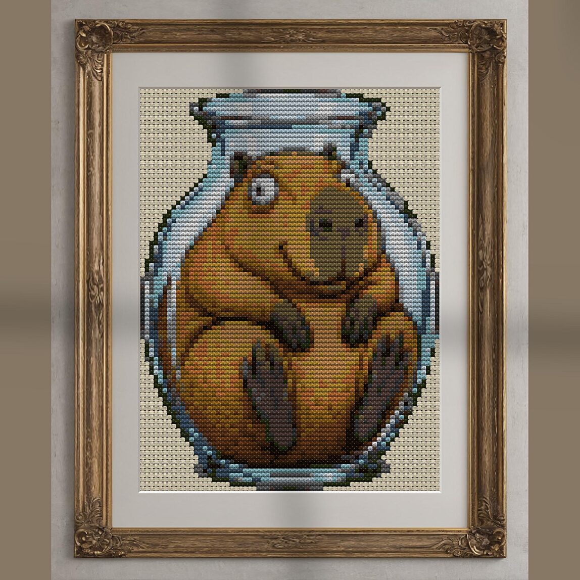 capybara-in-glass alternative framed cross stitch mockup, realistic finished embroidery presentation