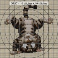 handstand-cat close-up cross stitch detail showing color changes, confetti areas and stitch texture