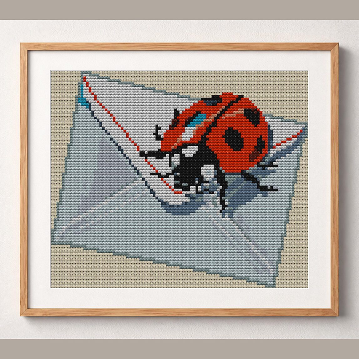 ladybug-reading-letter framed cross stitch mockup, realistic finished embroidery design, PDF pattern digital download