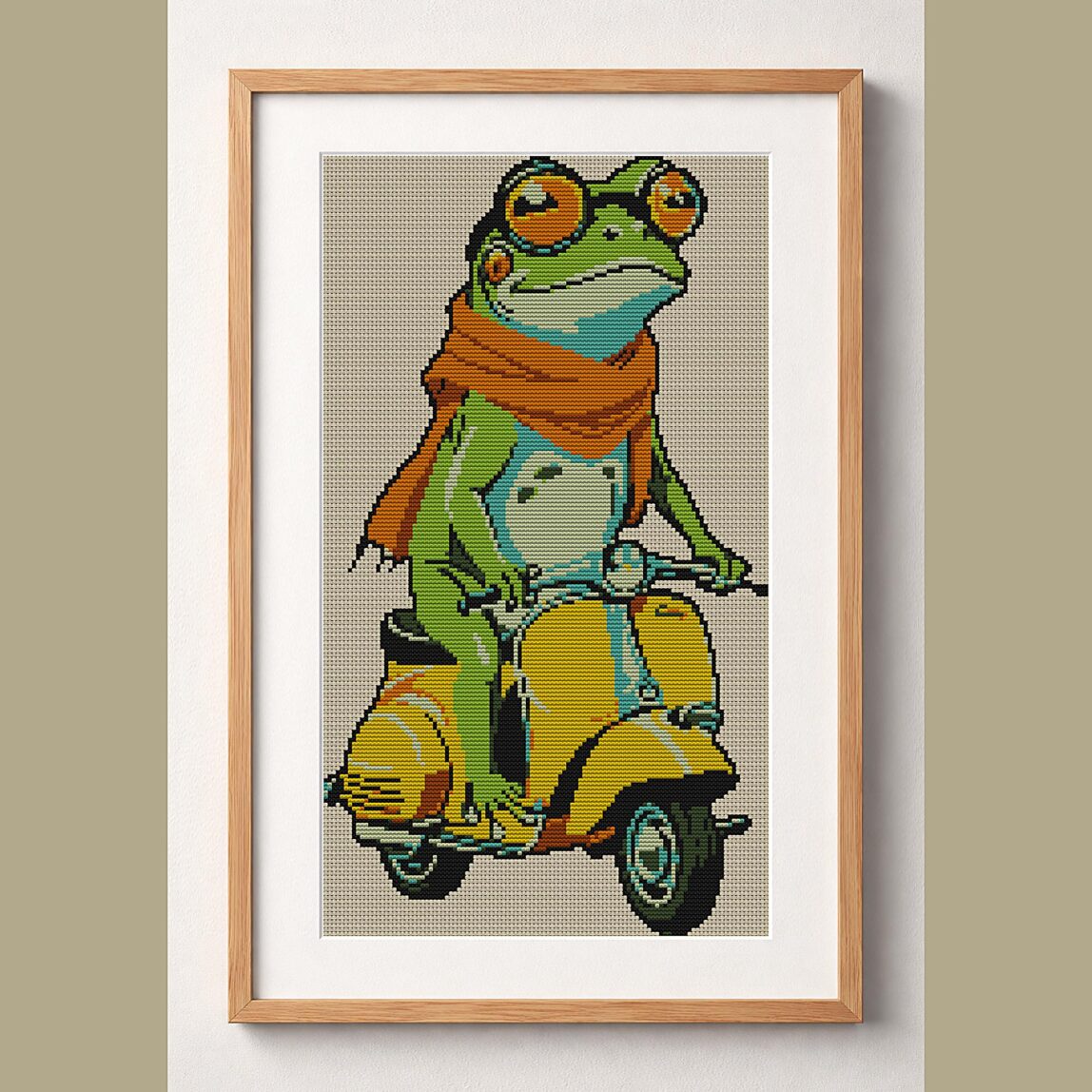 frog-on-vespa framed cross stitch mockup, realistic finished embroidery design, PDF pattern digital download
