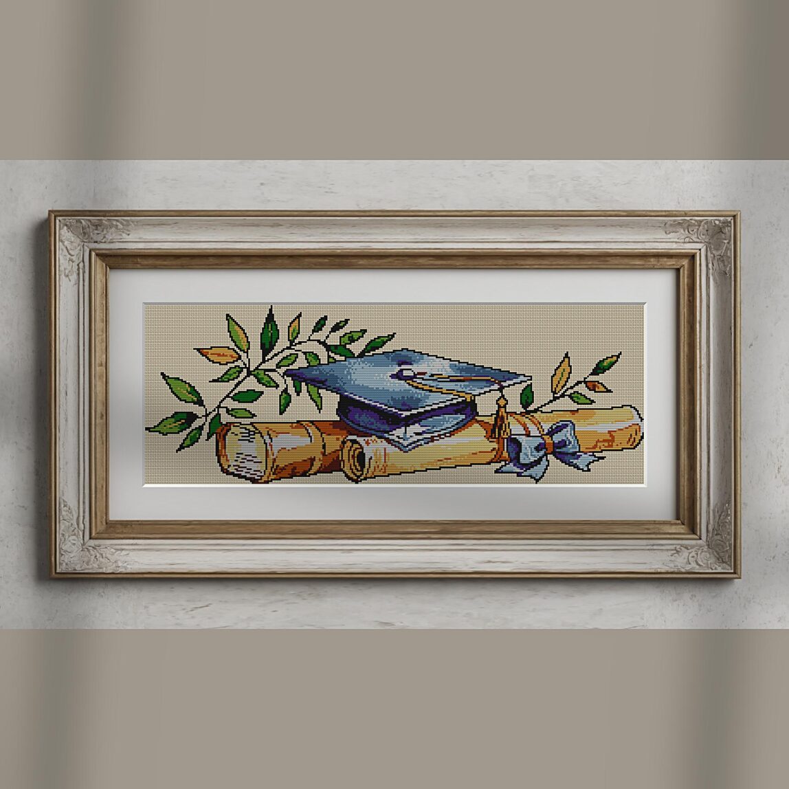 graduation-cap alternative framed cross stitch mockup, realistic finished embroidery presentation