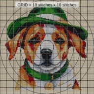 dog-green-hat close-up cross stitch detail showing color changes, confetti areas and stitch texture