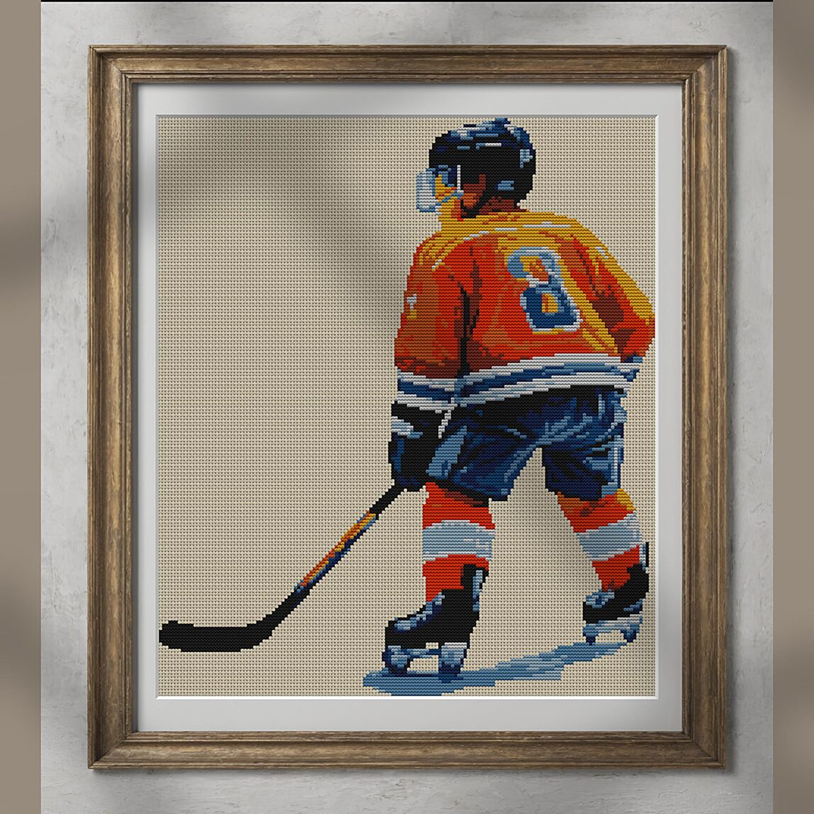 young-hockey-player alternative framed cross stitch mockup, realistic finished embroidery presentation
