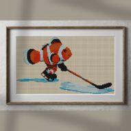 clownfish-hockey alternative framed cross stitch mockup, realistic finished embroidery presentation