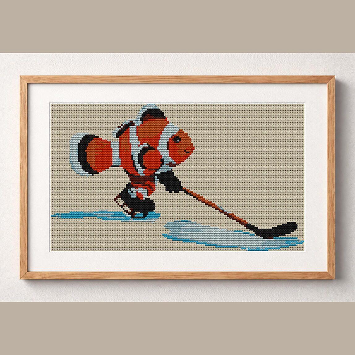 clownfish-hockey framed cross stitch mockup, realistic finished embroidery design, PDF pattern digital download