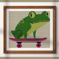 skate-or-die alternative framed cross stitch mockup, realistic finished embroidery presentation