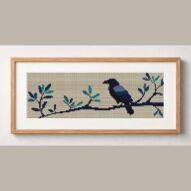 raven-on-branch framed cross stitch mockup, realistic finished embroidery design, PDF pattern digital download