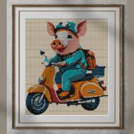 pig-on-scooter alternative framed cross stitch mockup, realistic finished embroidery presentation